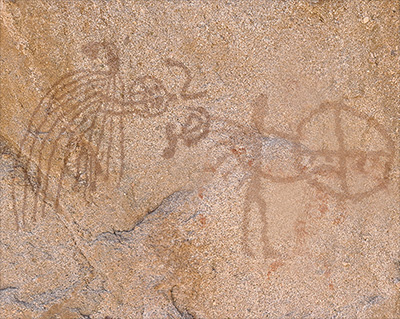 Picture of rock art showing shamans beating drums to induce altered consciousness.